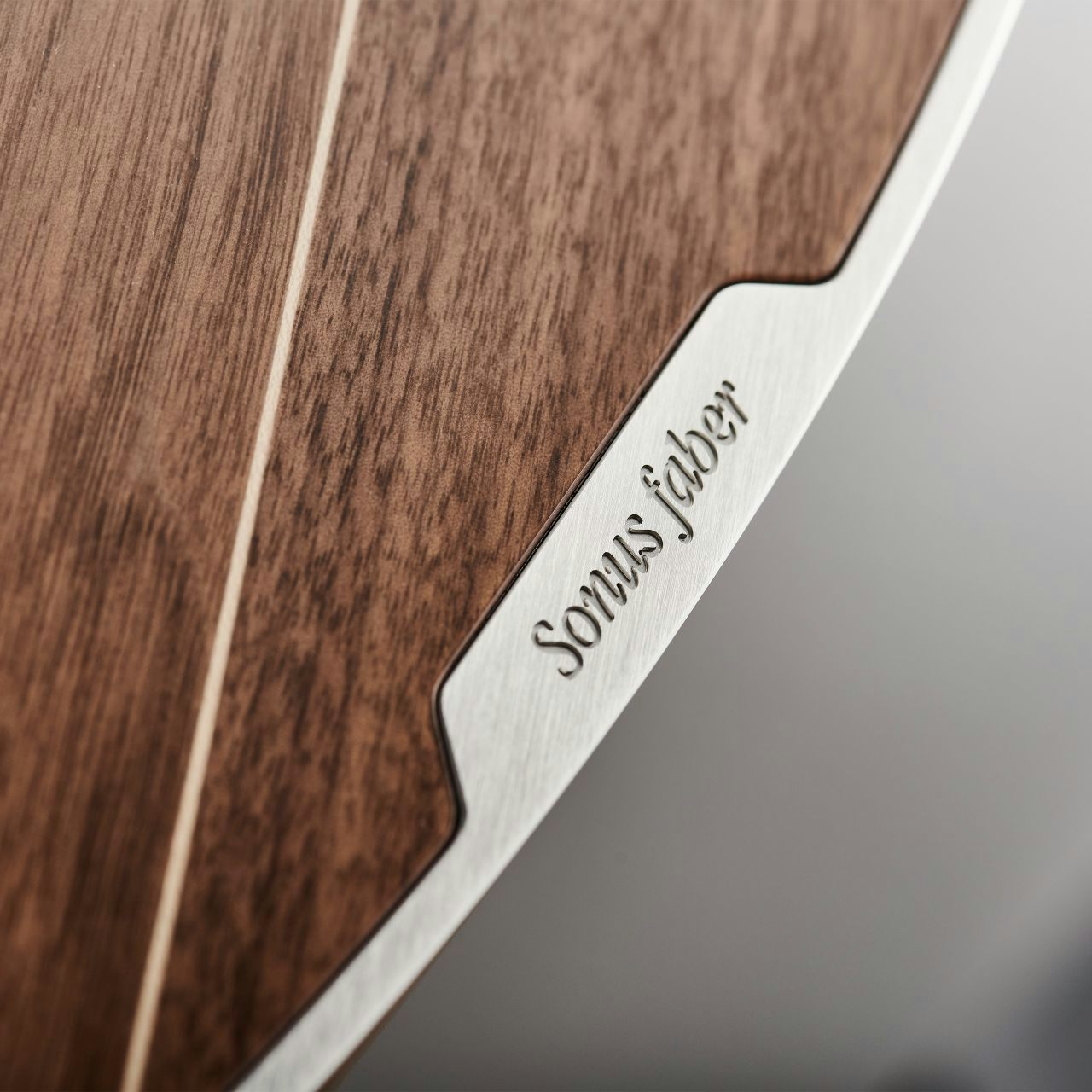 Close-up of Sonus faber Olympica Nova II floorstanding speaker, highlighting the beautiful Walnut wood finish.