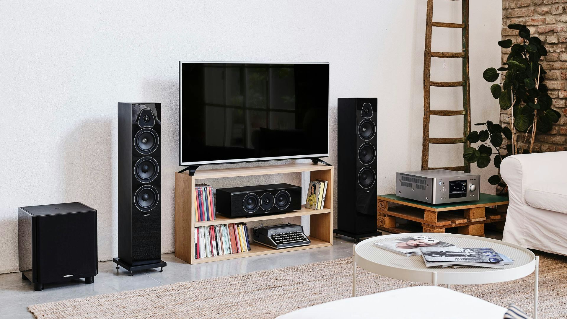 Sonus faber Lumina Collection speakers in wenge wood, crafting a home cinema ambiance for immersive listening.